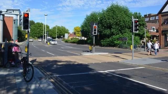 A pelican crossing controlled by traffic lights