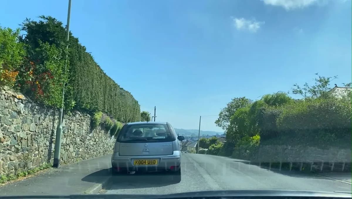 Choosing a hold back point behind a parked car