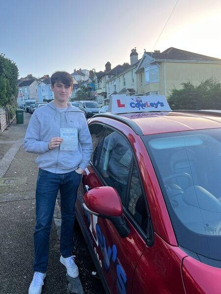A Cowley's pupil celebrating passing their driving test