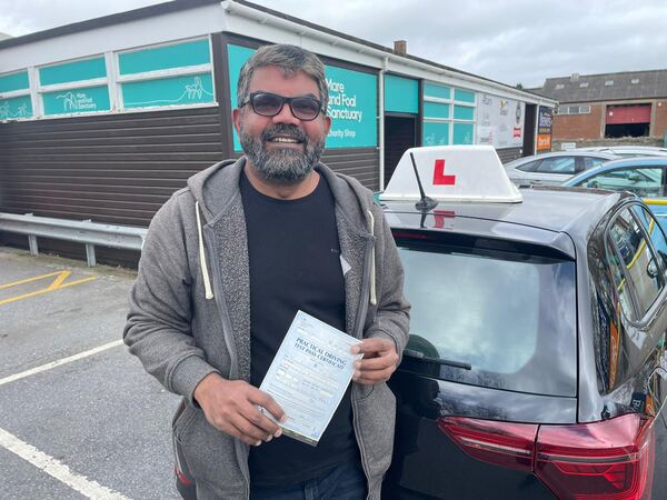 A Cowley's pupil celebrating passing their driving test