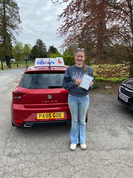 A Cowley's pupil celebrating passing their driving test