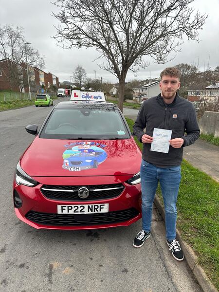A Cowley's pupil celebrating passing their driving test