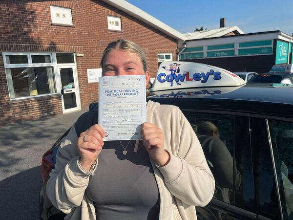 A Cowley's pupil celebrating passing their driving test